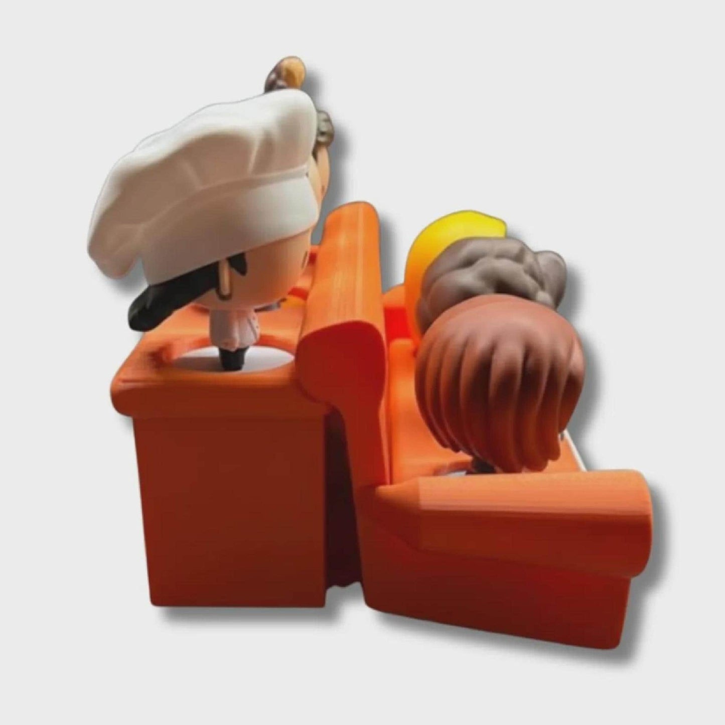 Orange sofa display stand; FRIENDS base, 90s nostalgia desk decor for toy collectors.
