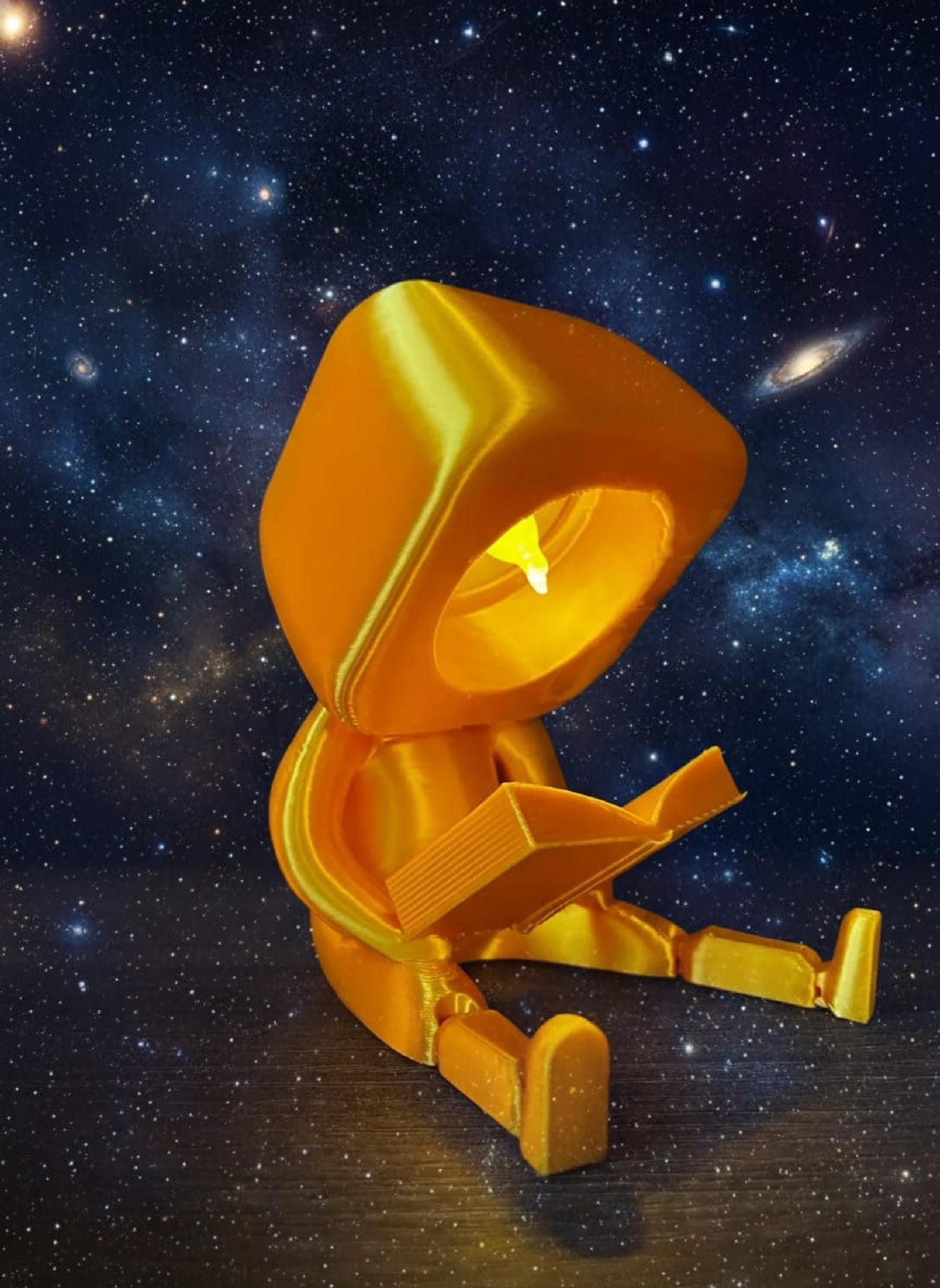 Enfeite Luminoso Articulado Personagem Lendo Livro Ideal para Decoração de Estantes e Mesas