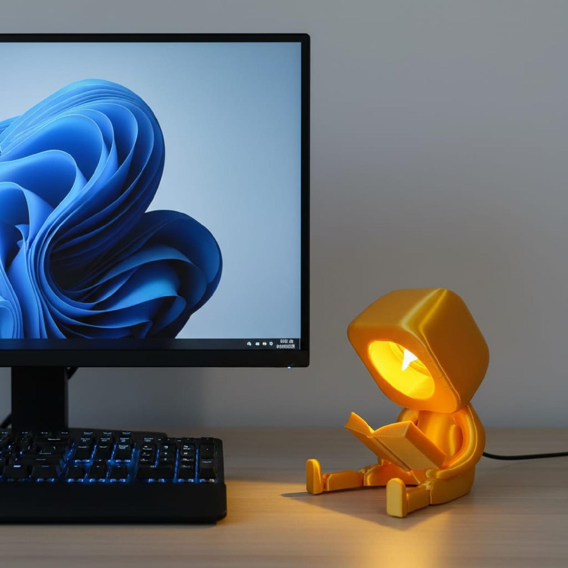 Enfeite Luminoso Articulado Personagem Lendo Livro Ideal para Decoração de Estantes e Mesas